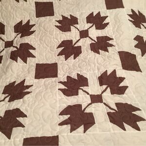 Brown and White Leaf Pattern Quilt